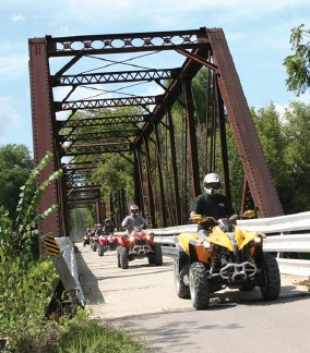 ATV Riding over Bridge